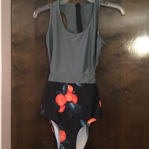 NWOT one piece w cutouts